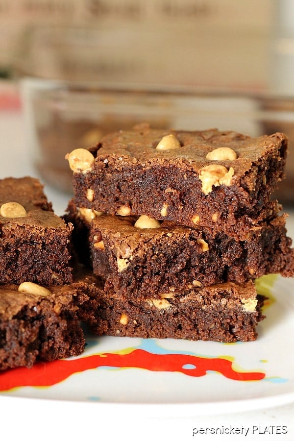 Peanut Butter Brownies are a simple, from scratch, brownie filled with chunky peanut butter and topped with peanut butter chips. Perfect for the chocolate + peanut butter lover in your life! | Persnickety Plates