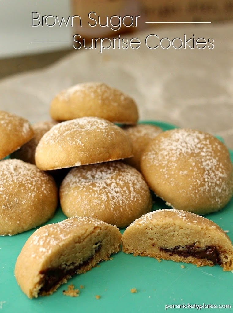 Brown Sugar Surprise Cookies - a simple, buttery, brown sugar cookie filled with a chocolate surprise! | www.persnicketyplates.com Brown Sugar Surprise Cookies - a simple, buttery, brown sugar cookie filled with a chocolate surprise! | www.persnicketyplates.com
