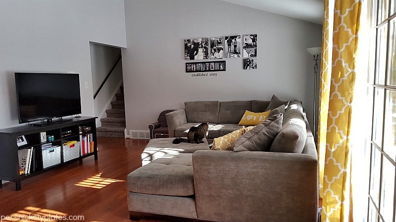 Before and after pictures of our living room/dining room done on a budget. Changing paint makes a huge difference - with Benjamin Moore Stonington Gray & Timber Wolf | Persnickety Plates