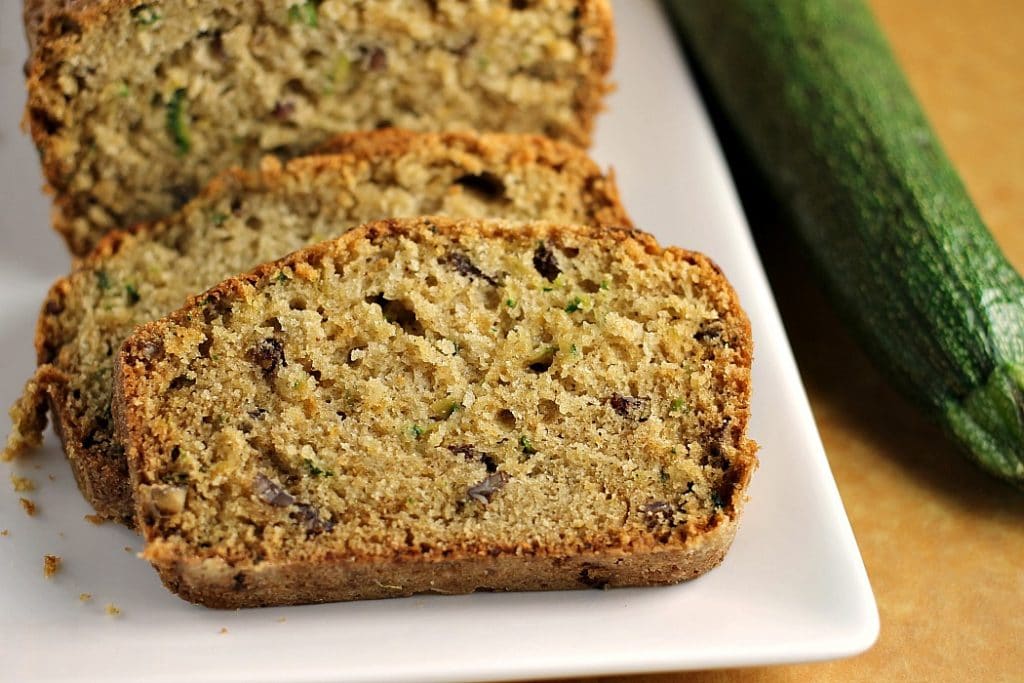 Classic Zucchini Bread filled with pecans (and sometimes chocolate chips!) is a simple but delicious way to use up your summer zucchini crop. | Persnickety Plates