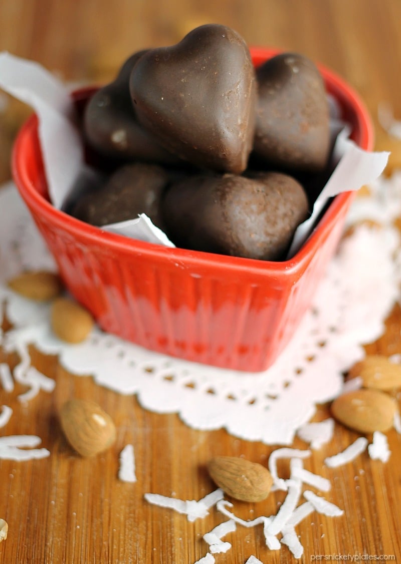 Dark Chocolate Toasted Almond and Coconut Hearts are a sweet, homemade goody perfect for Valentine's Day or anytime you want to treat yourself. | www.persnicketyplates.com