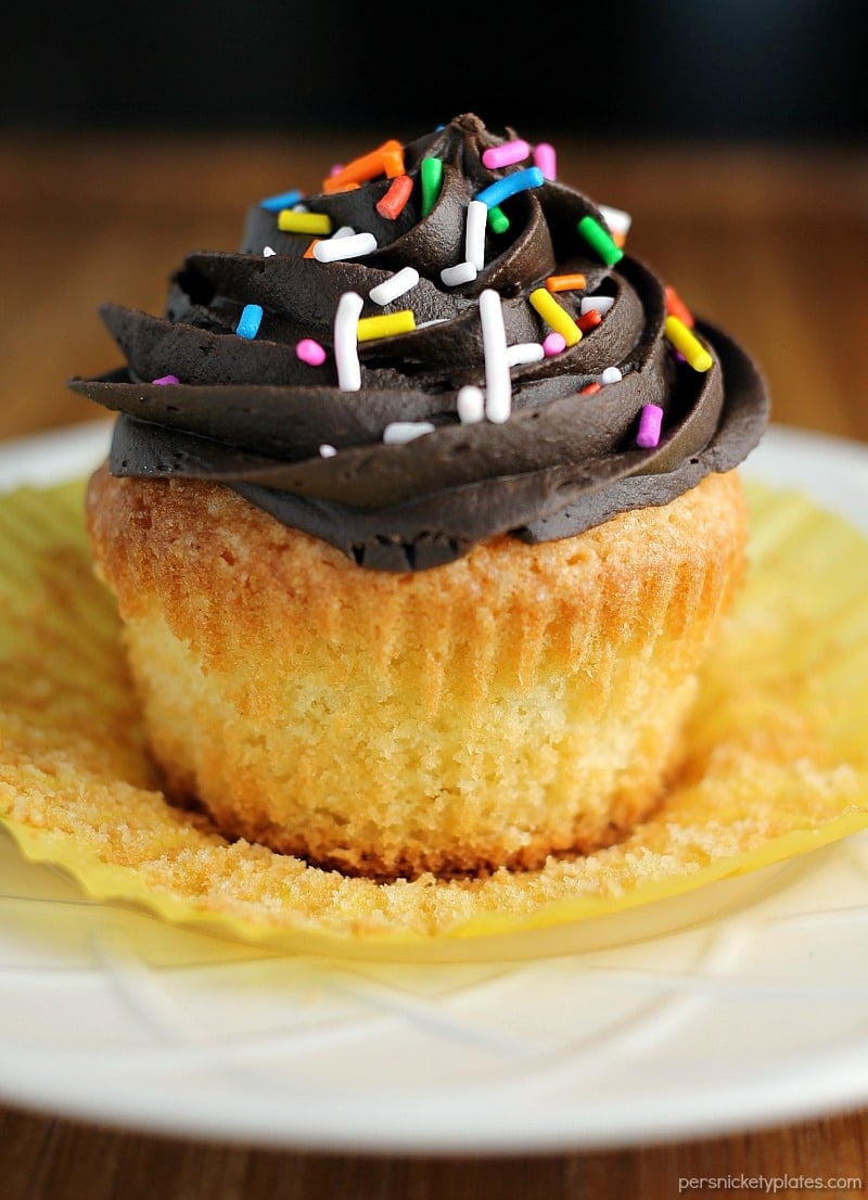Vanilla Cupcakes made from scratch should be a staple recipe in every bakers' arsenal. This recipe makes a small batch perfect to satisfy a craving. | www.persnicketyplates.com
