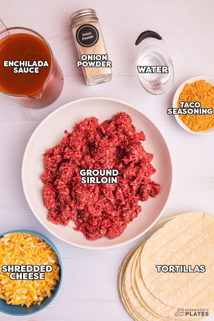 overhead shot of labeled ingredients laid out to make beef enchiladas.