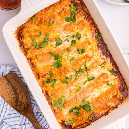 overhead shot of a baking dish of beef enchiladas.
