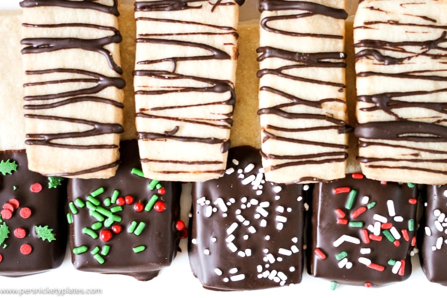 platter of shortbread cookies with chocolate and christmas sprinkles