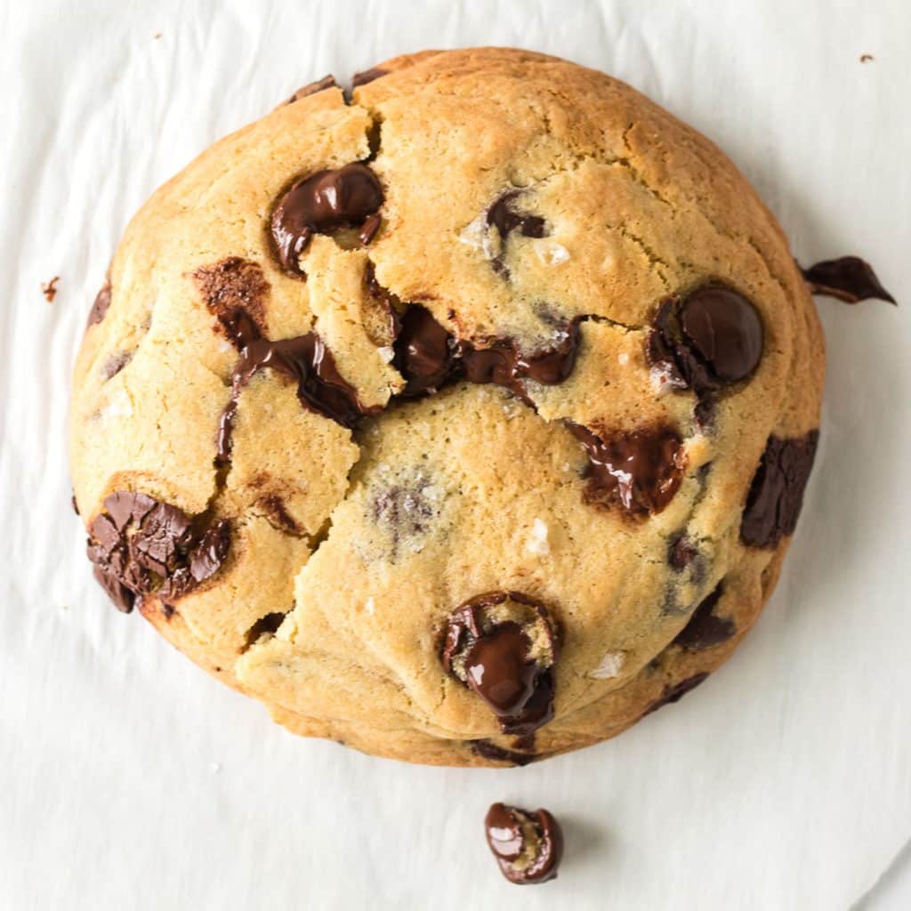overhead shot of a giant single serve chocolate chip cookie.