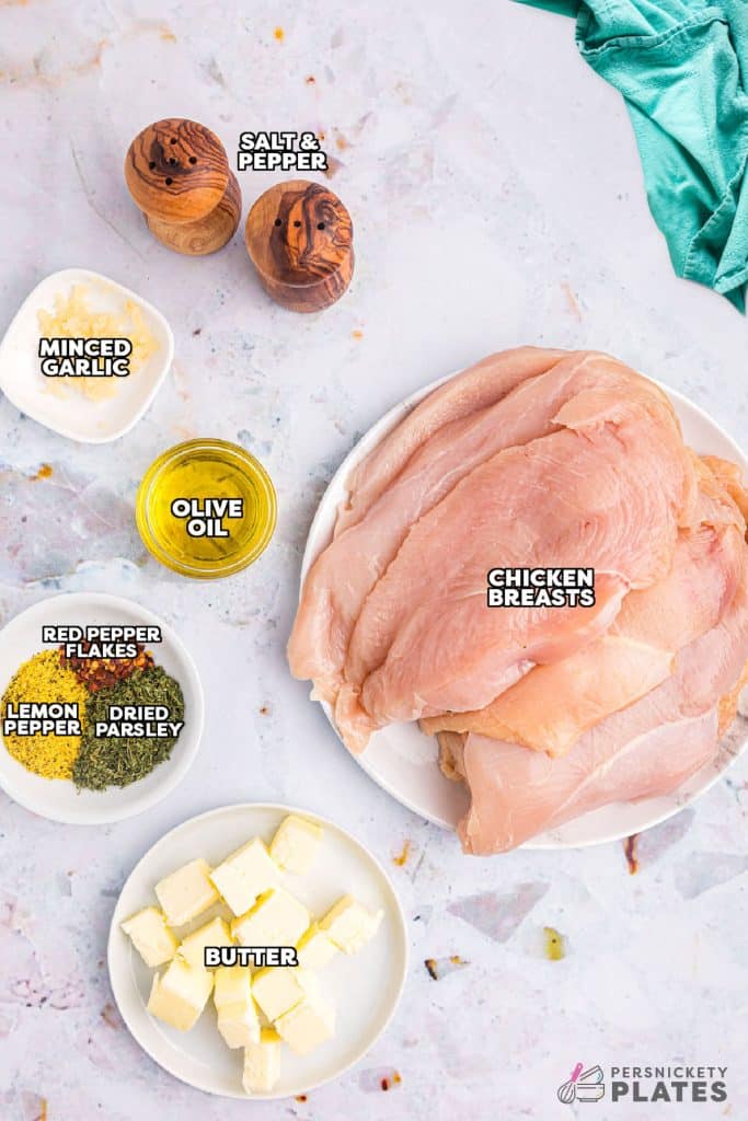 overhead shot of labeled ingredients laid out to make baked chicken.