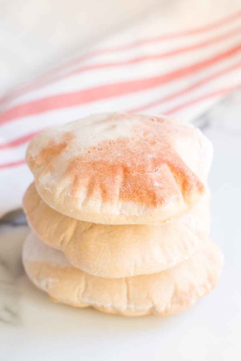 stack of 3 golden brown homemade pita breads