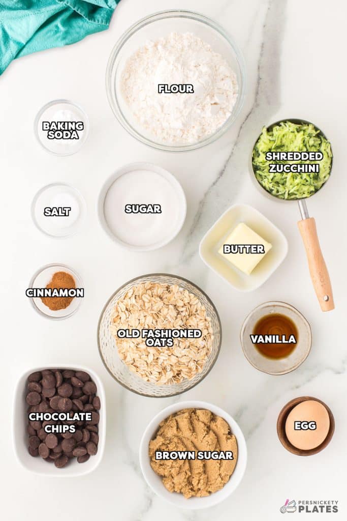 overhead shot of labeled ingredient laid out to make zucchini oatmeal cookies.