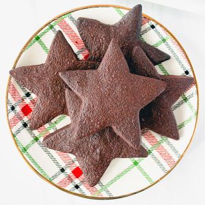 plate of star shaped chocolate shortbread cookies