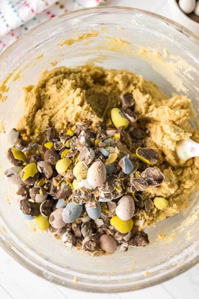 overhead shot of cookie dough with crushed cadbury eggs in it.