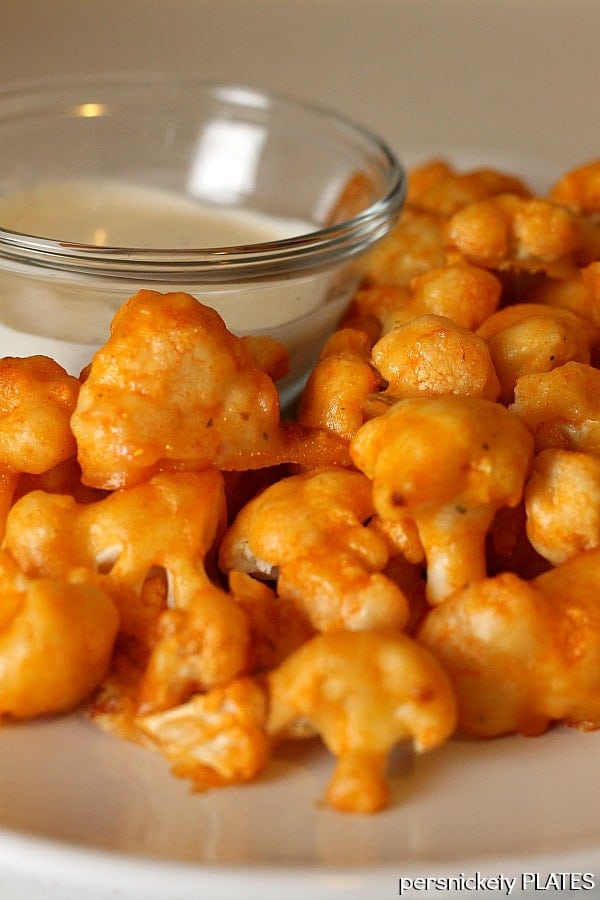 pile of buffalo cauliflower bites on a white plate