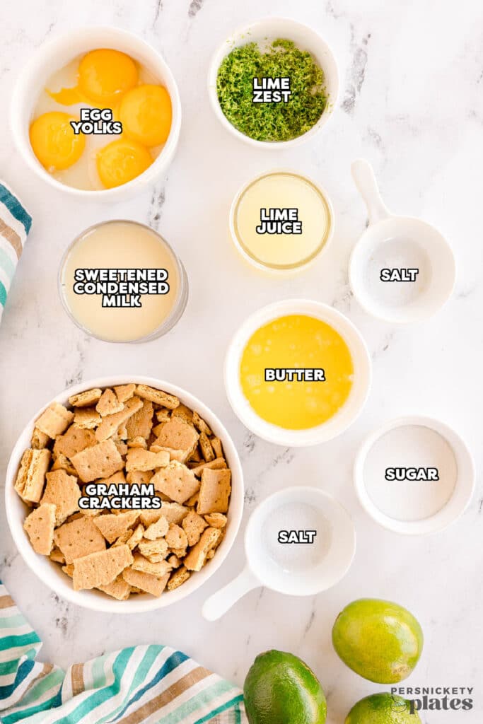 overhead shot of labeled ingredients laid out to make key lime pie.
