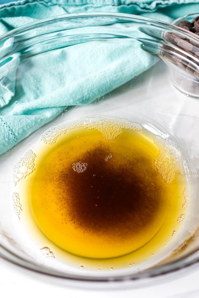 browned butter in a glass mixing bowl.