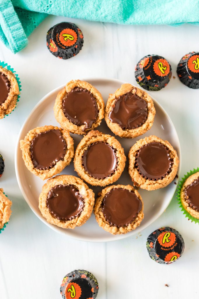overhead shot of white plate holding peanut butter cup cookies.