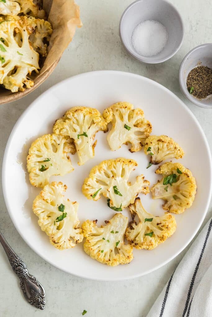 roasted cauliflower on a white plate.