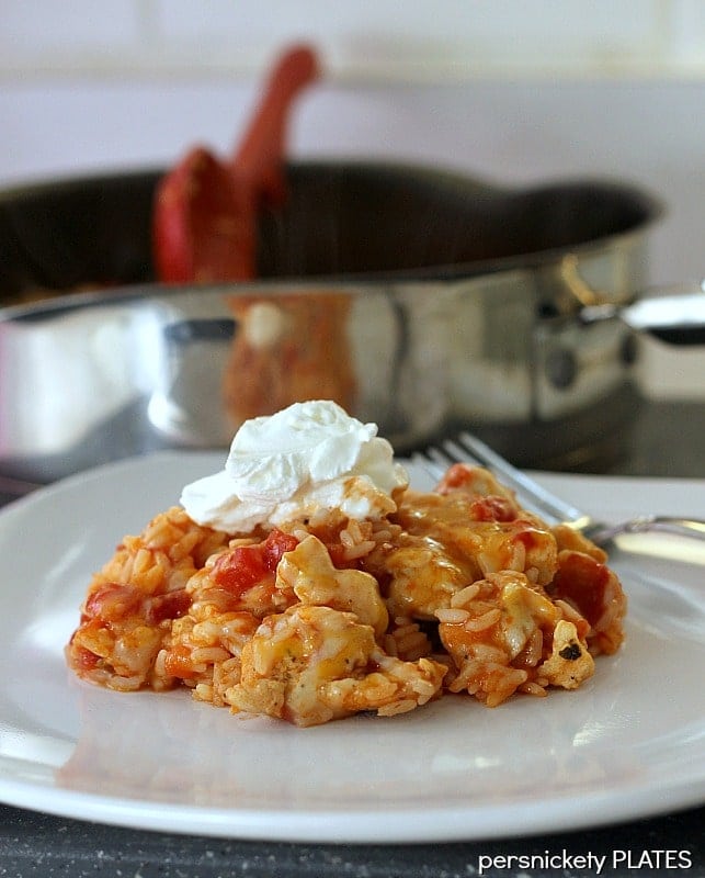 serving of southwest chicken on a plate topped with sour cream