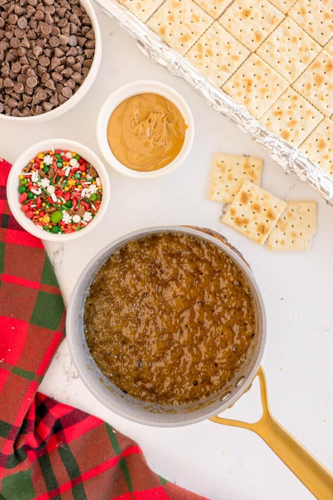 overhead shot of bubbling toffee in a saucepan.