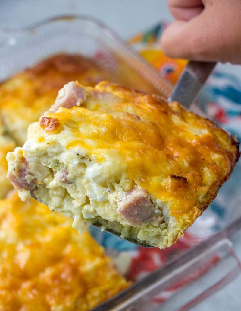 serving of ham & potato breakfast casserole over a baking dish