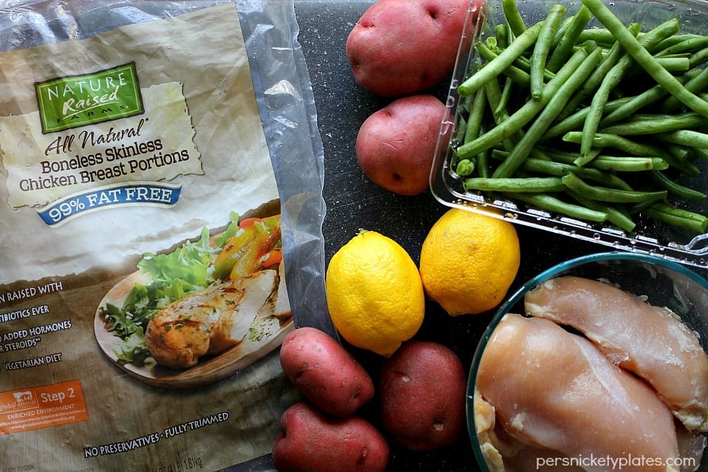 chicken breasts potatoes, green beans & lemon ready to prep Slow Cooker Chicken, Potatoes, & Green Beans - your entire dinner made right in the crock pot! | www.persnicketyplates.com