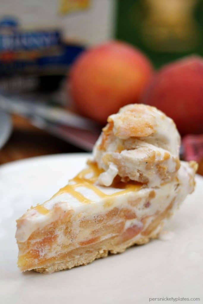 Peaches and Cream Ice Cream Pie Super simple Peaches and Cream Ice Cream Pie is filled with broiled peaches, creamy vanilla bean ice cream, in a graham cracker crust and drizzled with butterscotch sauce. The perfect dessert for a hot summer day! | Persnickety Plates #SunsOutSpoonsOut #ad