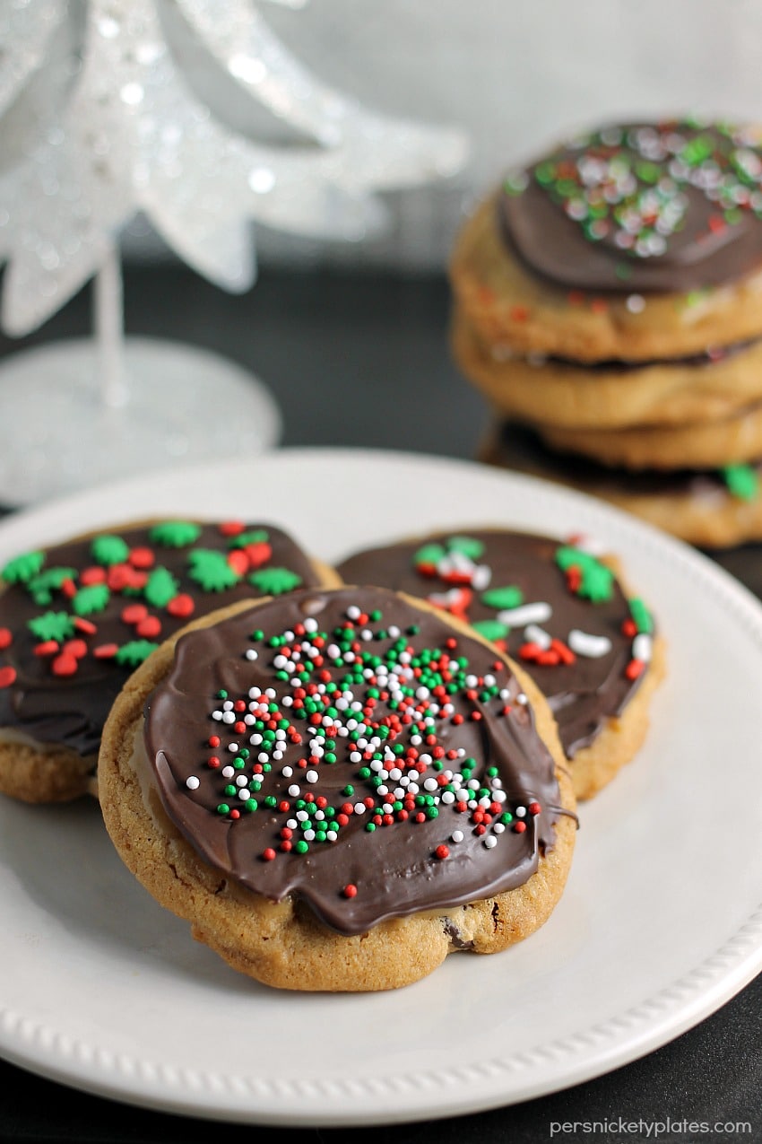 A brown butter chocolate chip cookie slathered with a layer of salted caramel then topped with chocolate and sprinkles. | Persnickety Plates