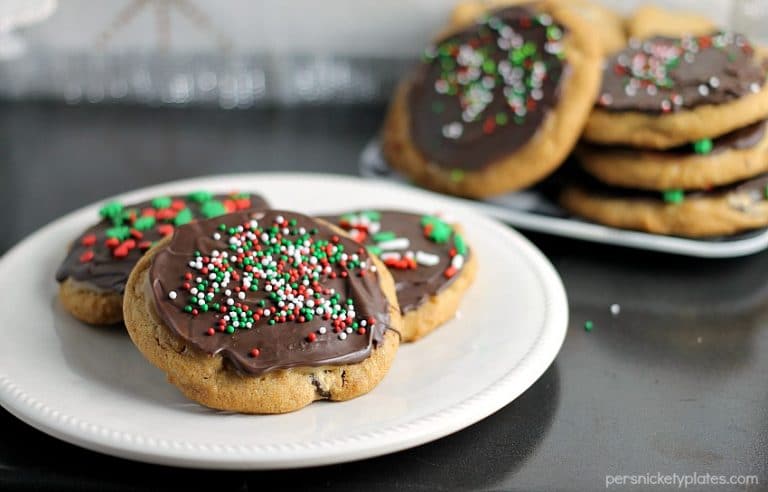 A brown butter chocolate chip cookie slathered with a layer of salted caramel then topped with chocolate and sprinkles. | Persnickety Plates