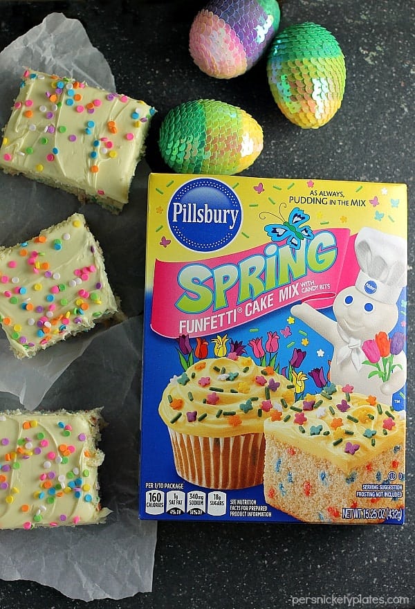 Cream Cheese Funfetti Bars are simple, semi-homemade treats that are perfect to kick off spring baking. Start with a box funfetti cake mix and add cream cheese to make these fun and delicious bars! | www.persnicketyplates.com