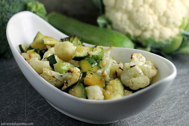Simple blend of roasted broccoli, cauliflower, and zucchini flavored with dollops of Marzetti Lemon Basil finishing sauce. | Persnickety Plates AD