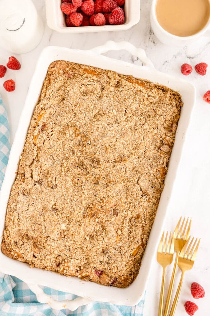 overhead shot of a freshly baked raspberry coffee cake in the pan.