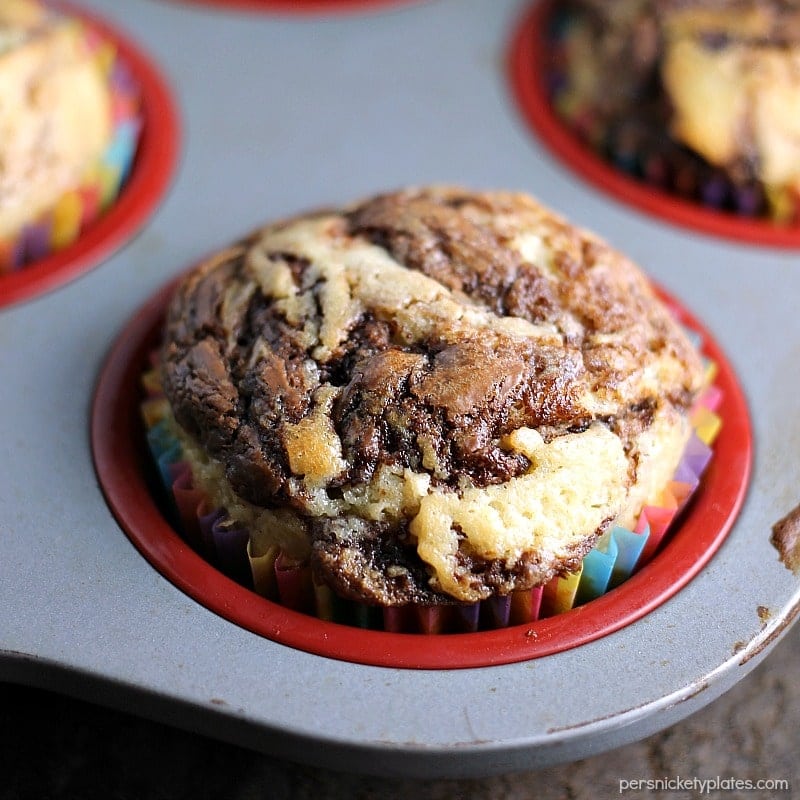 close up of nutella swirl muffin in muffin tin