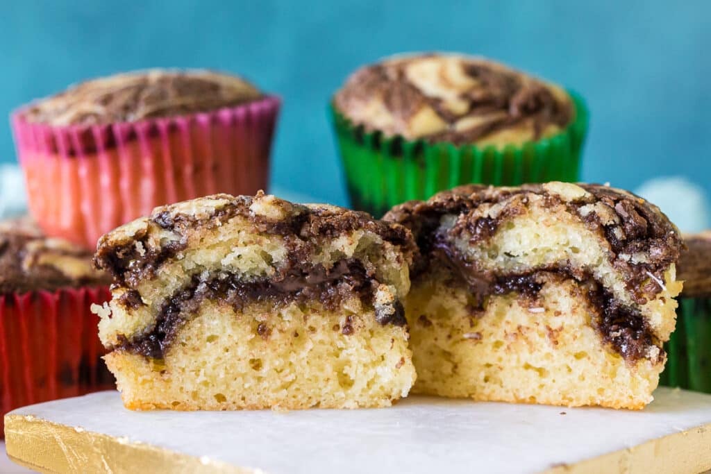 nutella muffin sliced opened to show the swirls.