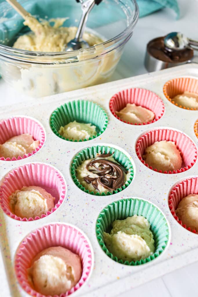 nutella swirling into muffin batter.