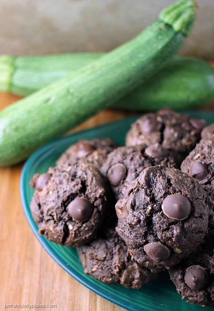 Chocolate Zucchini Drop Cookies are a sweet way to use up some of your zucchini crop. You end up with a moist, chocolatey cookie that's filled with chocolate chips but you don't even have to get out your mixer! | Persnickety Plates