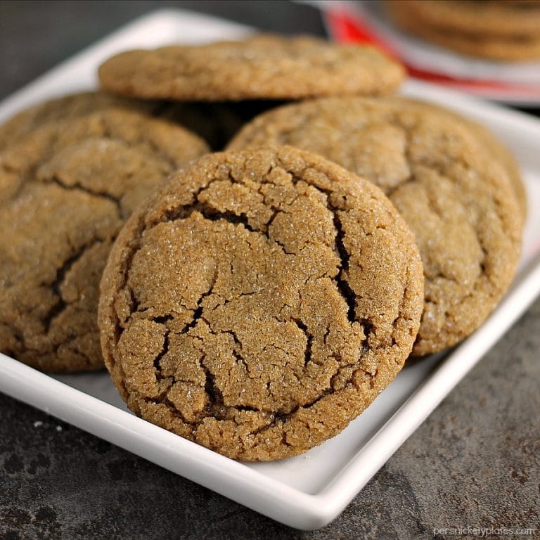 close up of ginger snap cookies on white plate