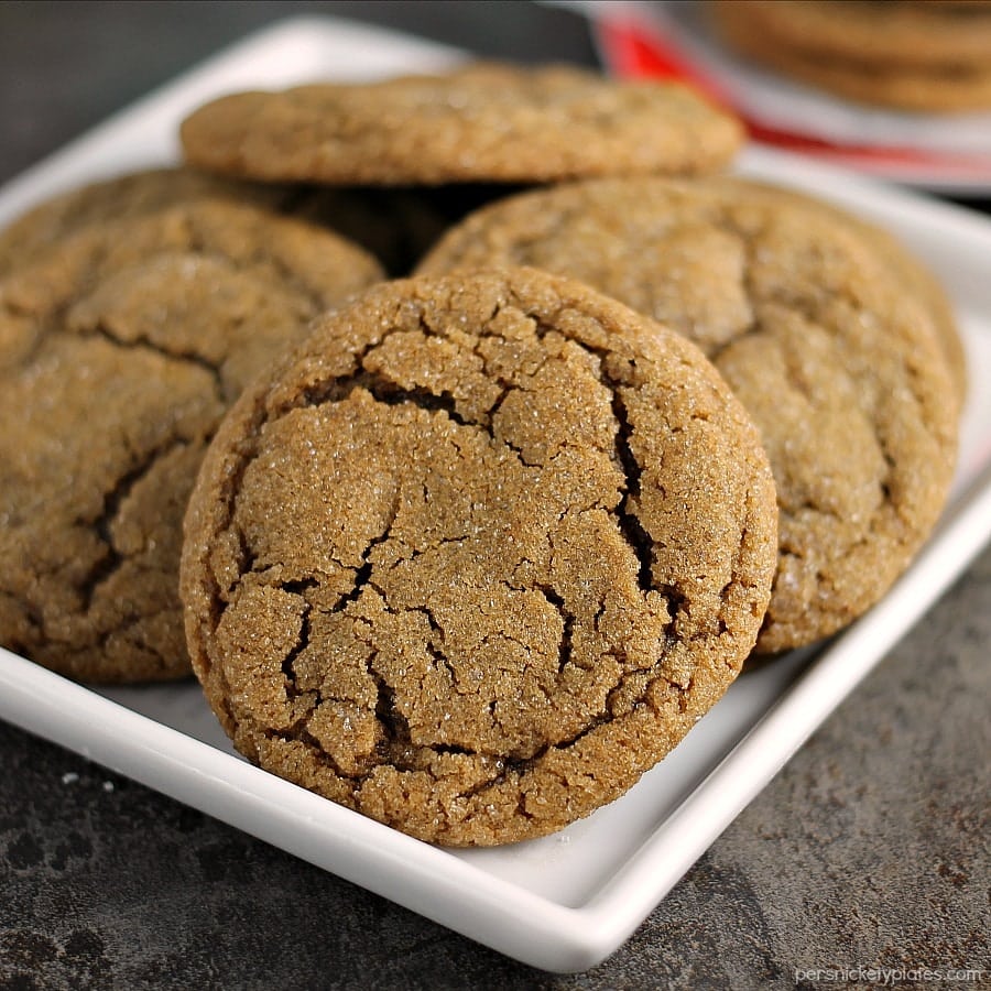 close up of ginger snap cookies on white plate