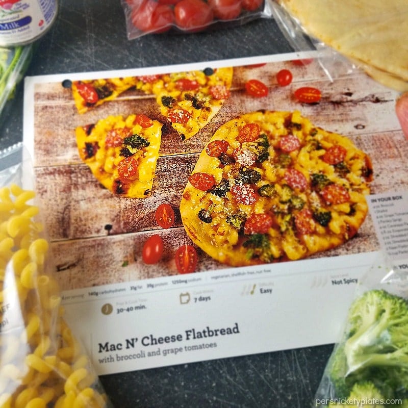 Macaroni and Cheese Flatbread topped with roasted broccoli, grape tomatoes, and panko bread crumbs makes a filling dinner or a great appetizer. | www.persnicketyplates.com