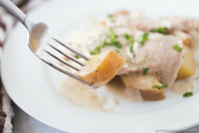 bite of red skin potato on a fork