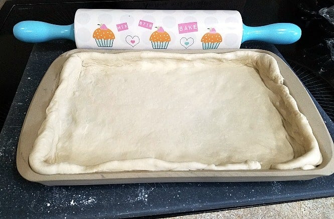 dough pressed into a jelly roll pan.
