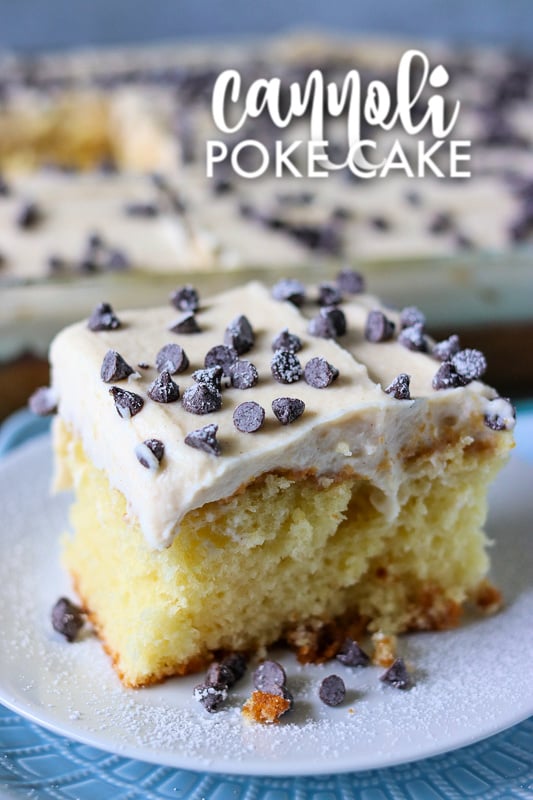 single slice of cannoli poke cake with mini chocolate chips