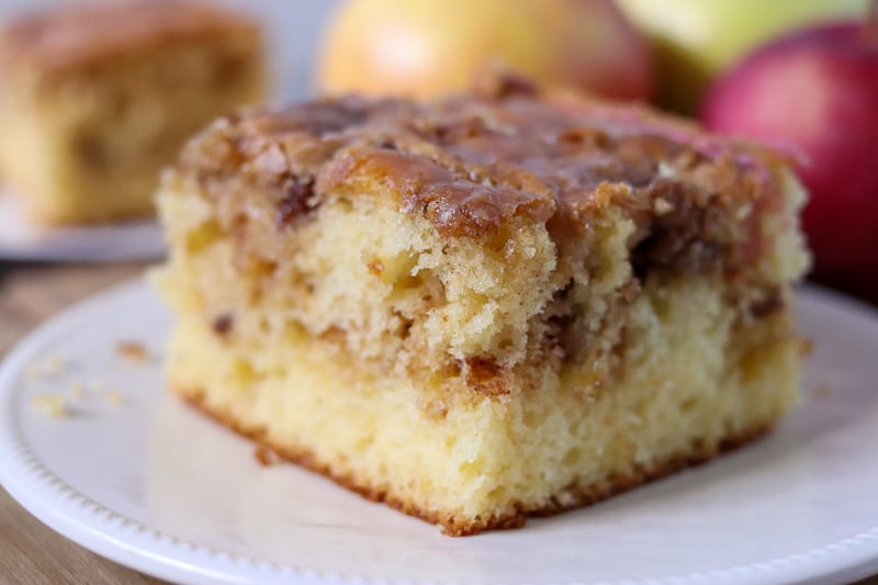 layered honey bun cake slice on white plate