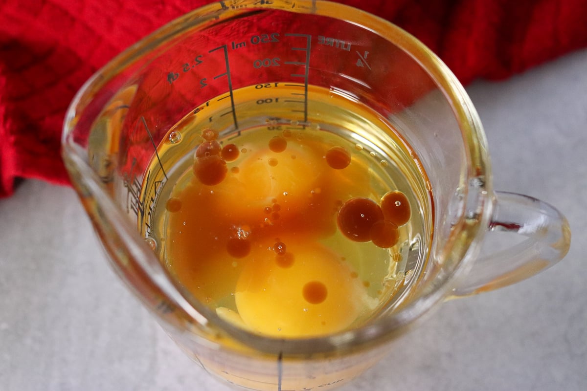 wet ingredients in a measuring cup