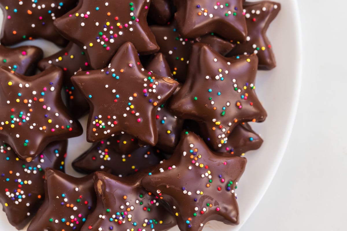 close up of dark chocolate shortbread star cookies