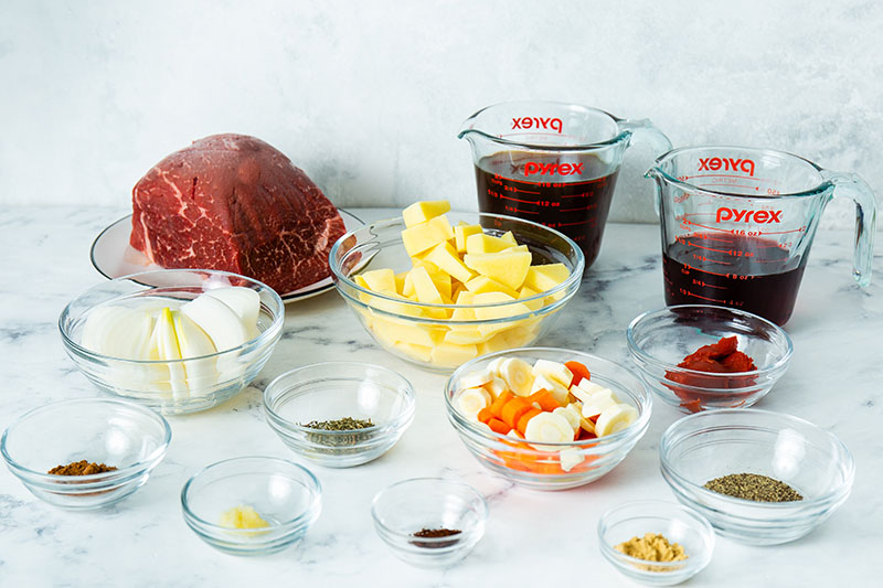 pot roast ingredients prepped & laid out in glass bowls