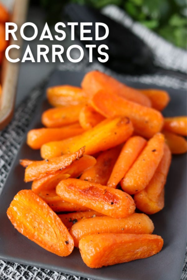 roasted carrots on a grey plate