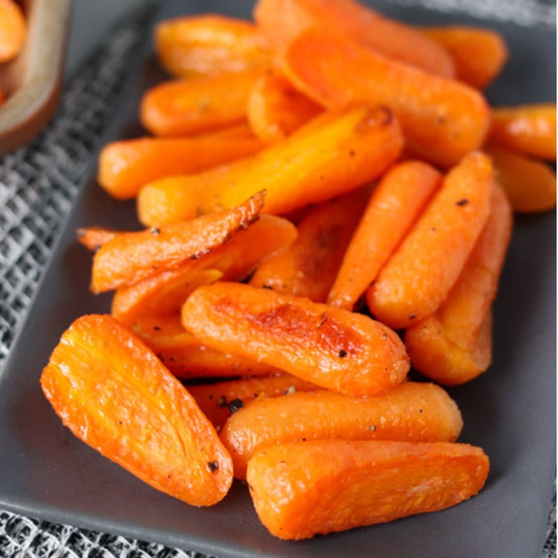 close up of carrots on a plate