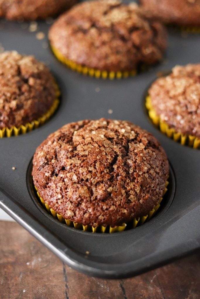 double chocolate banana muffins in baking pan.