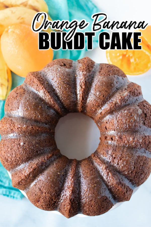 overhead shot of orange banana bundt cake with title text