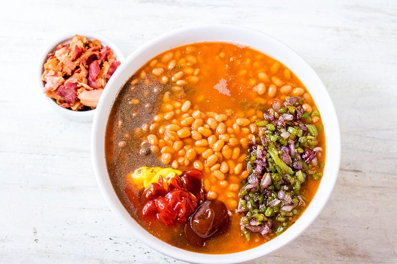 bowl of beans & ingredients to jazz them up
