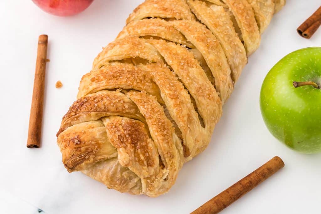 overhead shot of braided apple strudel.